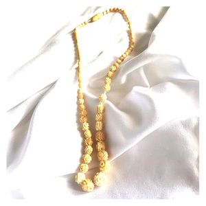 Hand carved beaded necklace